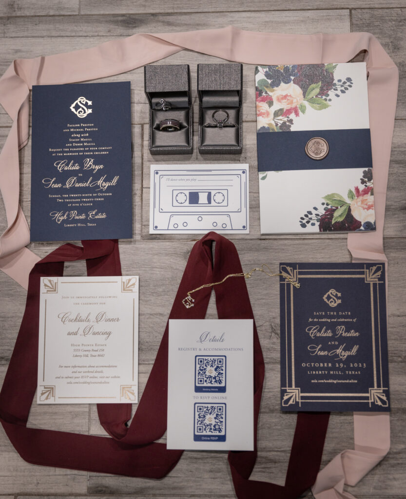 a navy blue and burgundy wedding invitation suite